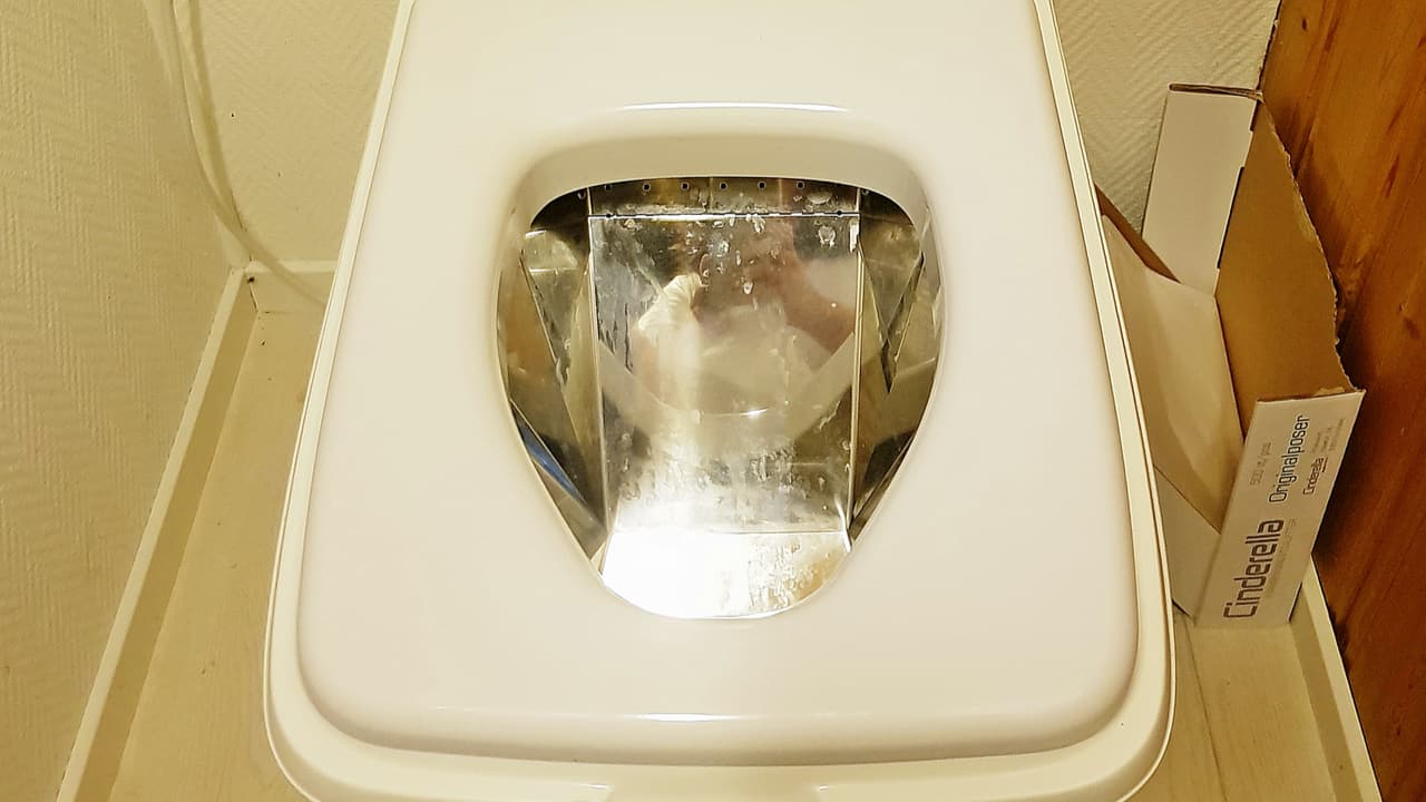 Close-up of an incinerating toilet