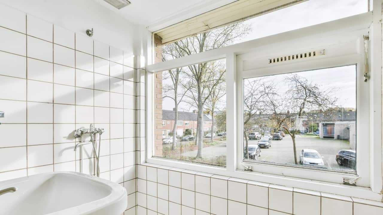 Bathroom with a window fan
